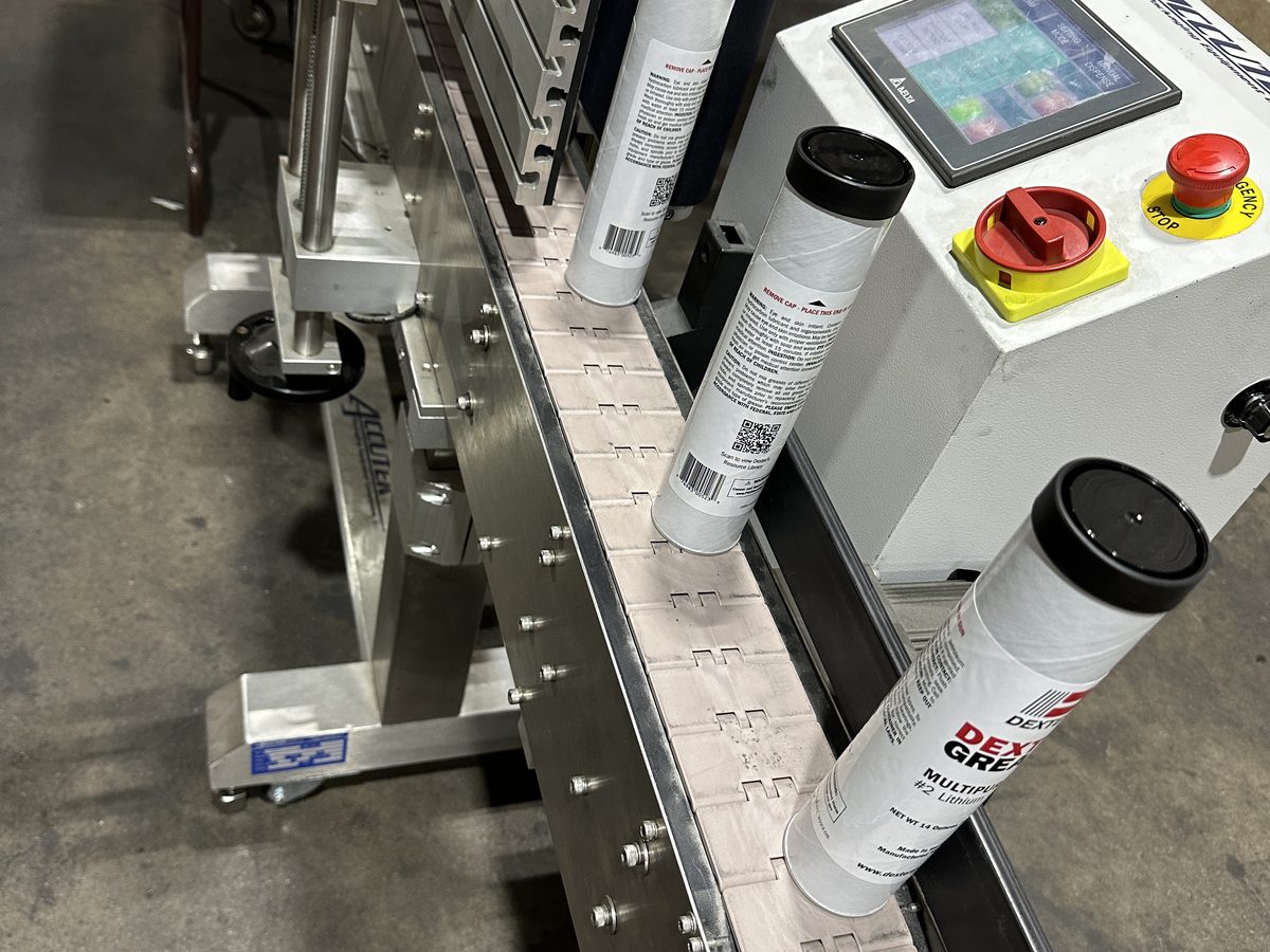 Grease tubes on the coding and labeling line