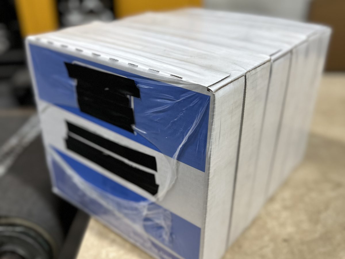 Grease tubes packed in 10-pack boxes and shrink-sleeved 30-pack masters